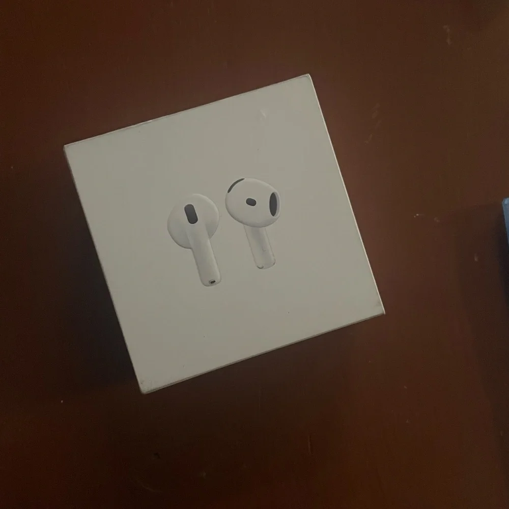 Apple White Wireless Earbuds with Charging Case- brand new, unopened